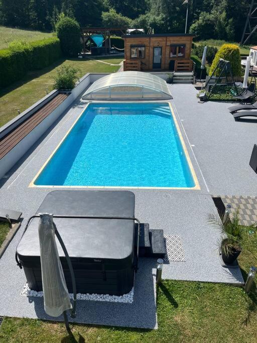 Chalet 2 Personnes Avec Jacuzzi Et Piscine Saisonniere Partagee Corcieux Esterno foto