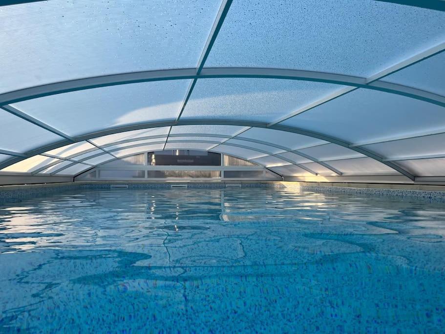 Chalet 2 Personnes Avec Jacuzzi Et Piscine Saisonniere Partagee Corcieux Esterno foto